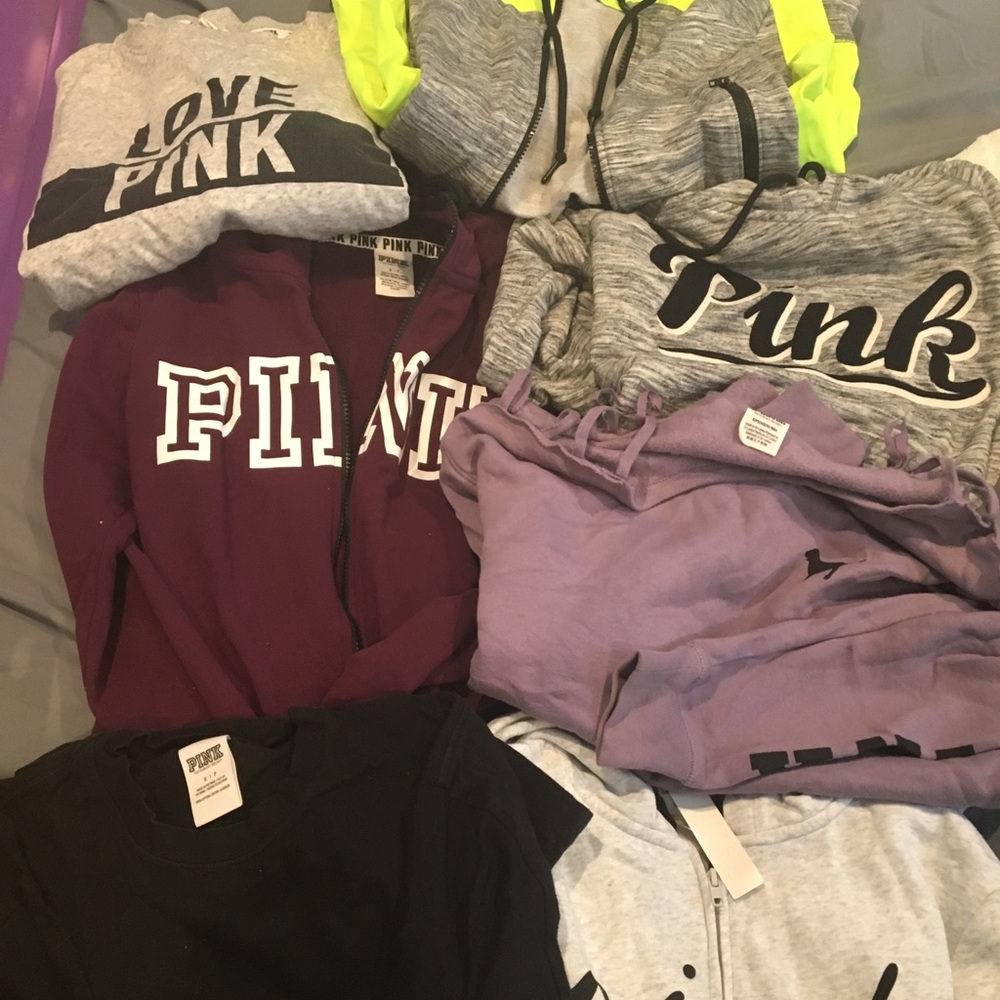 Multiple pink hoodies